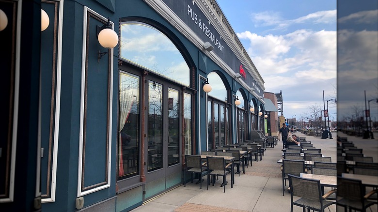 A local restaurant with tables on the sidewalk in downtown St. Louis Park