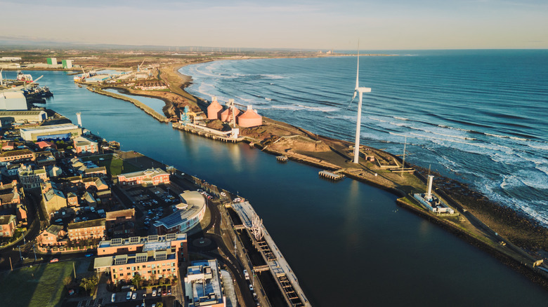Aerial view of buildings and roads facing the North Sea in Blyth, England