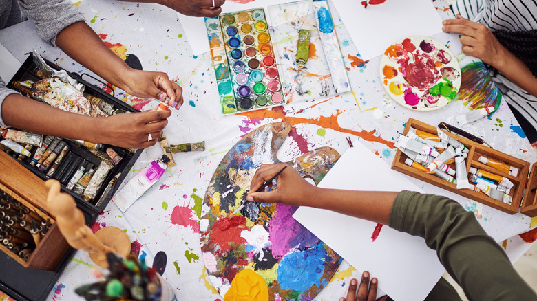 People painting and creating art