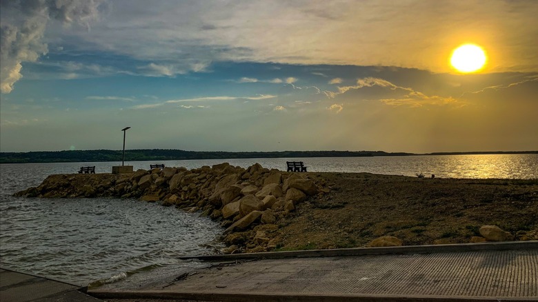 Golden hour views from a boat ramp overlooking Lovewell Reservoir, Lovewell State Park, Kansas.
