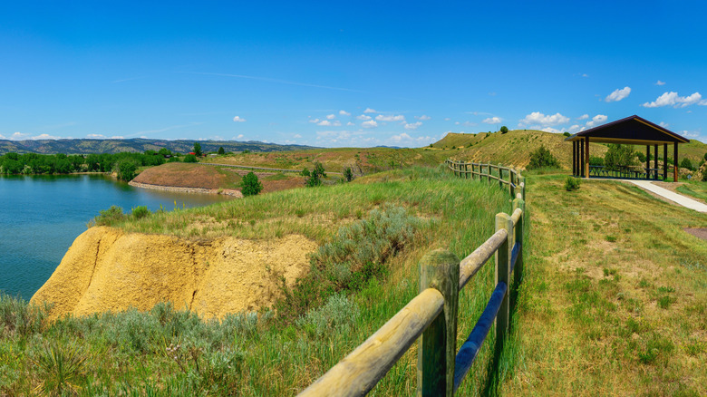 Cliffside hiking path and picnic pavilion in Angostura Recreation Area, South Dakota.