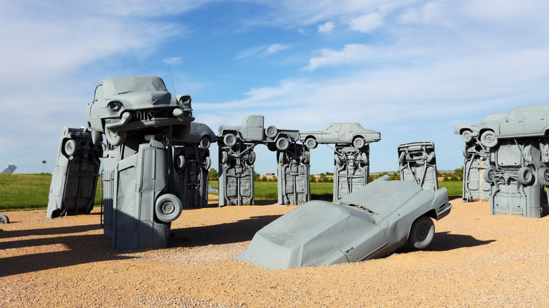 The painted cars arranged in a circle at the Carhenge monument in Alliance, Nebraska