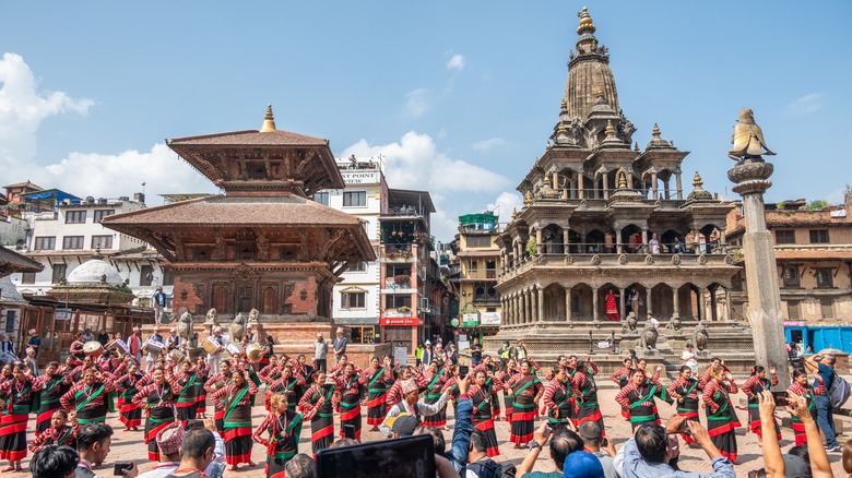 Dancers in the street during a festival in Patan, Nepal