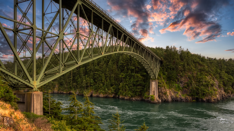A view of Deception Pass Bridge at sunset.