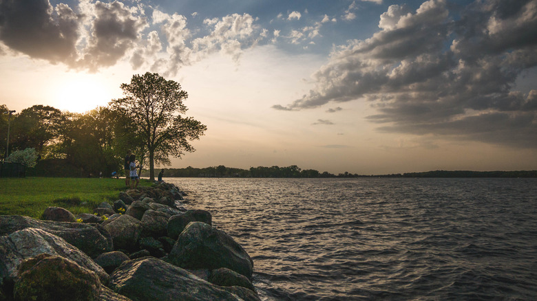 The rocky shoreline of Lake Minnetonka at sunset