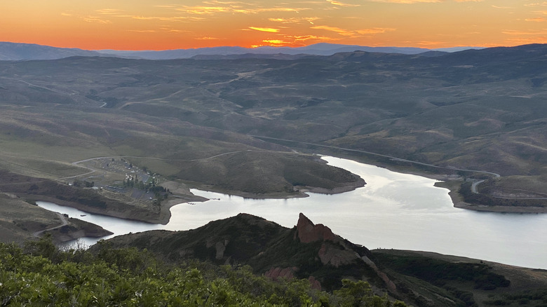 Orange sunrise glows over East Canyon State Park