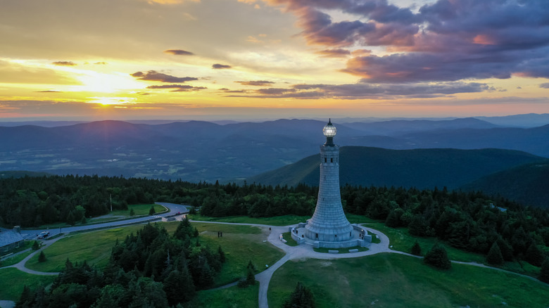 Aerial view of Veterans War Memorial Tower on top of Mt. Greylock at sunset
