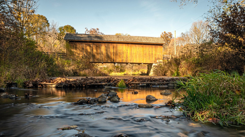 A historic covered bridge across the Little Beaver Creek in Ohio