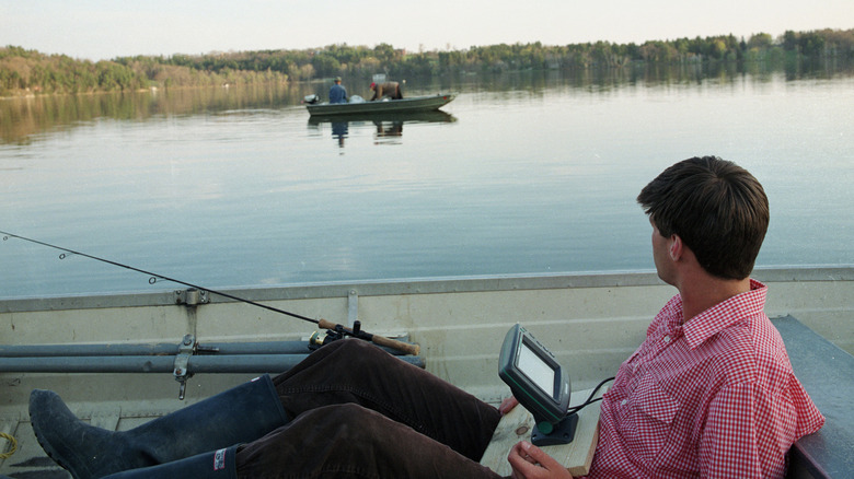 View of a fisherman on Lake Wononscopomuc