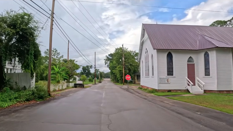 A view of a Bamburg street with an idyllic church on the side of the road
