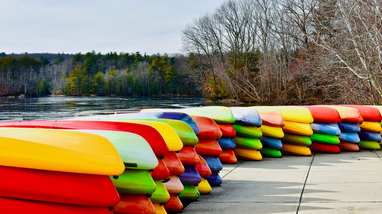 Canoes lined up on the dock at the Hopkinton State Park in winter