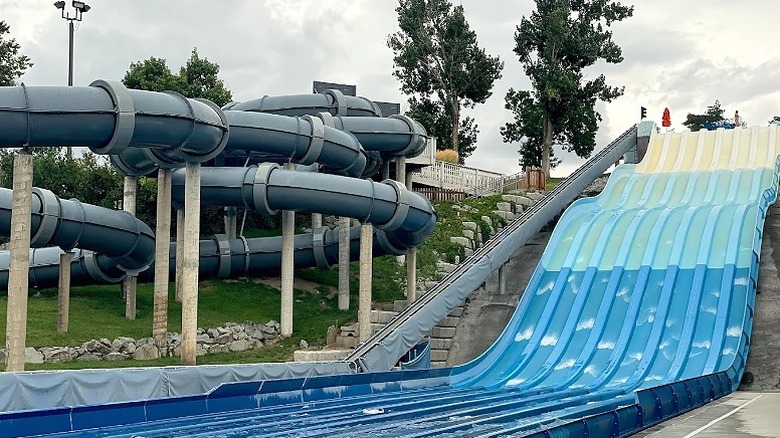 Racing slides and a twisting pipe waterslide at Water World in Colorado.