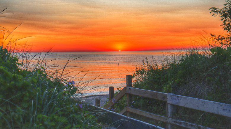 A view of Whihala Beach along Lake Michigan during sunset in Whiting, Indiana