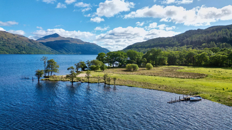 A small jetty juts in to Loch Lomond