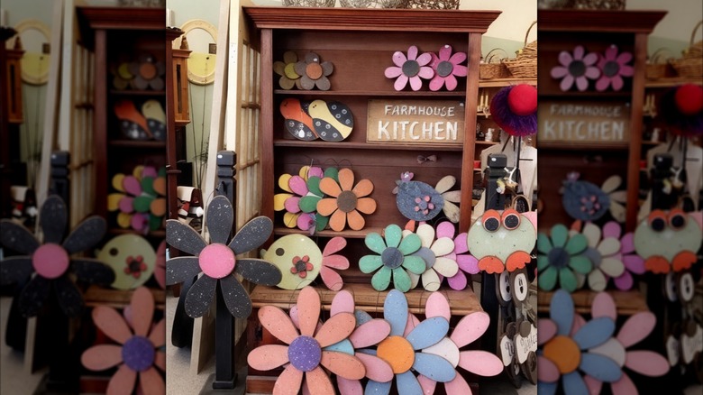 A cabinet with wooden flowers from the Gingham Dog in Monticello, Iowa