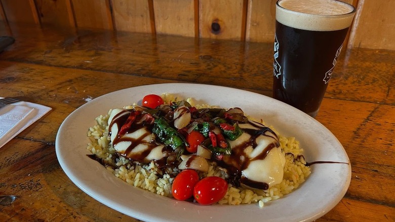 Plate of chicken and rice with vegetables from The Loon restaurant