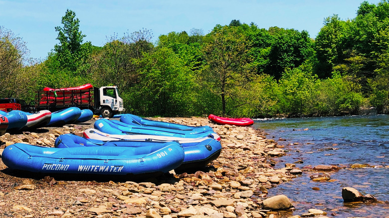 Rafts on a rocks by a river
