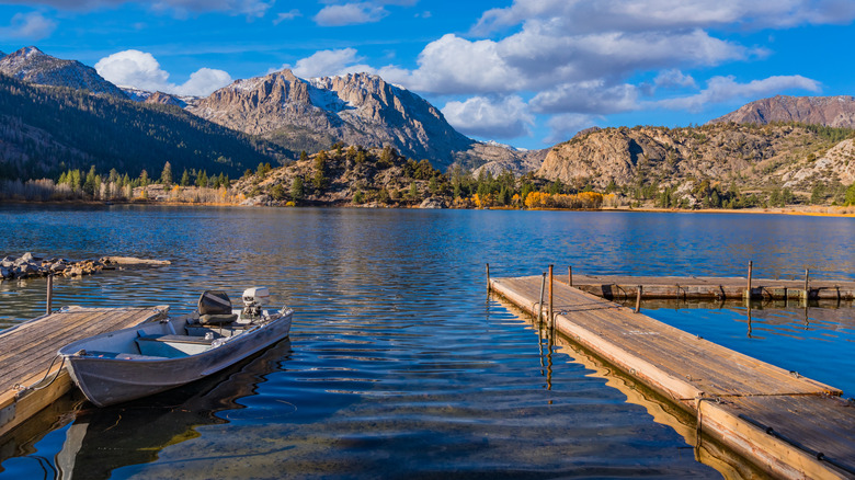 A boat tied to a pier on Gull Lake, California