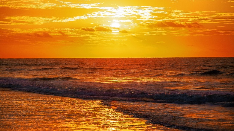 Sun setting over the water in Carolina Shores, North Carolina