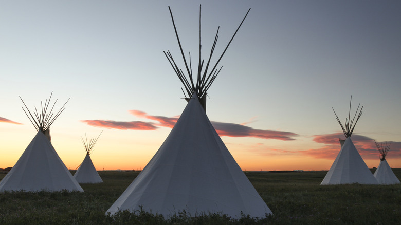 Teepees at sunset in Browning, Montana