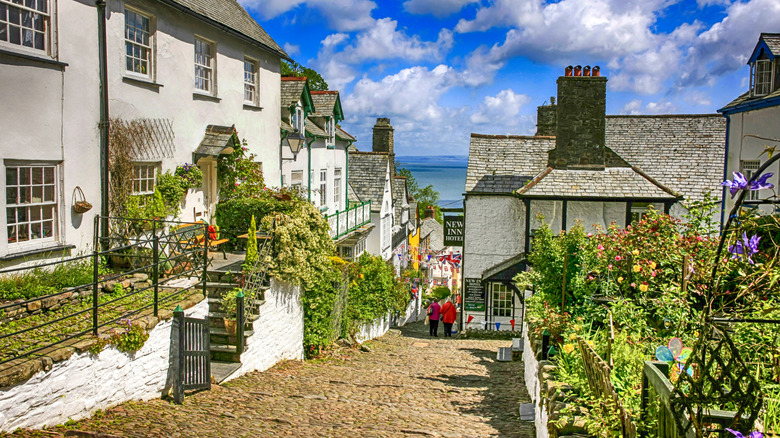 The narrow streets of Clovelly in western Devon with sea in background.