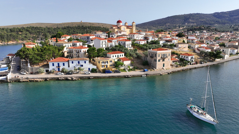 traditional Galaxidi buildings with boat nearby