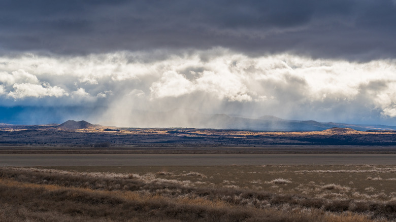 Rainstorm over winter landscape at Klamath Basin National Wildlife Refuge Complex