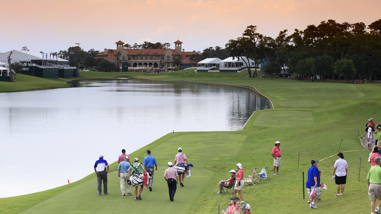 Sunset view of Sawgrass golf course with clubhouse in the background