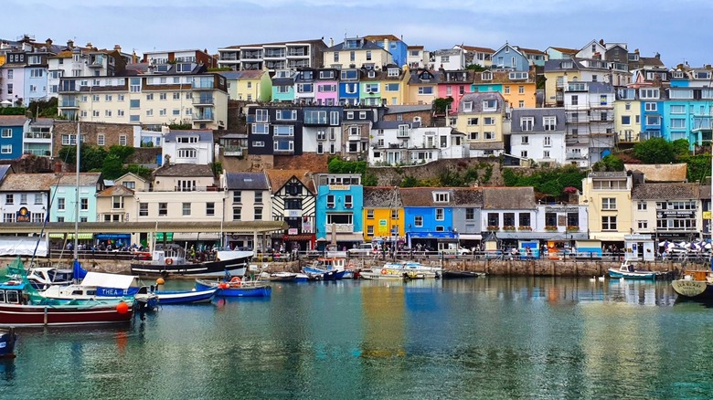 Charming, colorful buildings line the Brixham harbor
