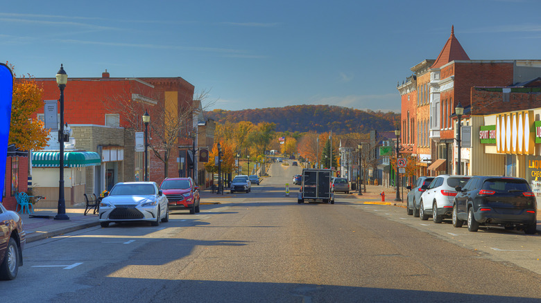 The Prairie du Chien downtown in fall with trees and mountain in the distance