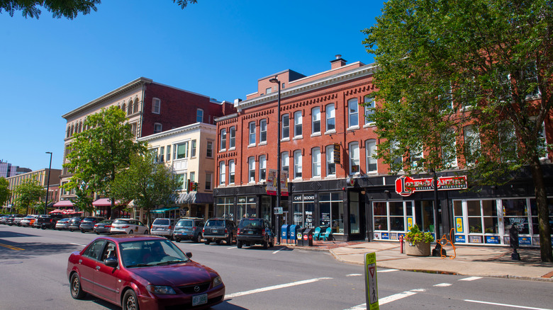 Commercial buildings along leafy Elm Street in downtown Manchester, New Hampshire