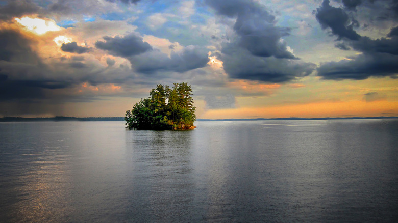 A small island in Sebago Lake, Maine during sunset