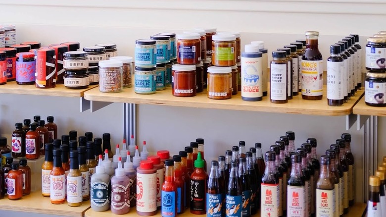 Various sauces and vinegars on shelves at Onggi
