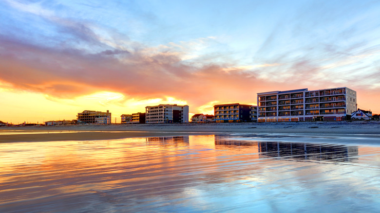 A resort on Hampton Beach, New Hampshire at sunset