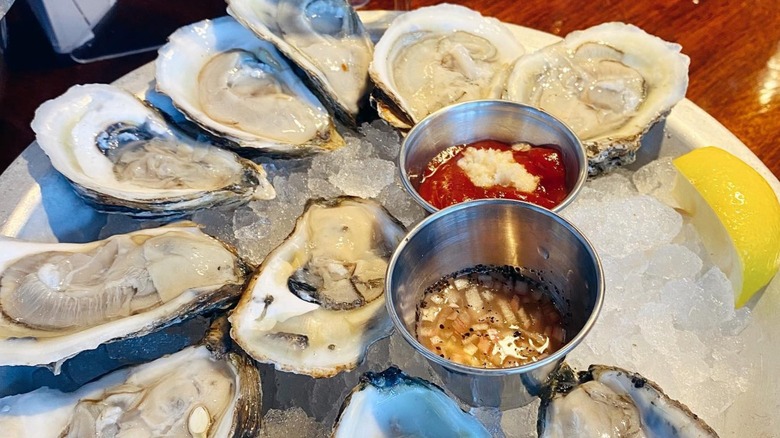A plate of a dozen local oysters on ice at Max's Oyster Bar in West Hartford, Connecticut.