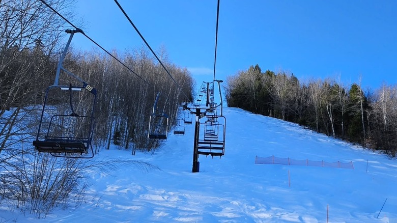 people skiing down a mountain slope