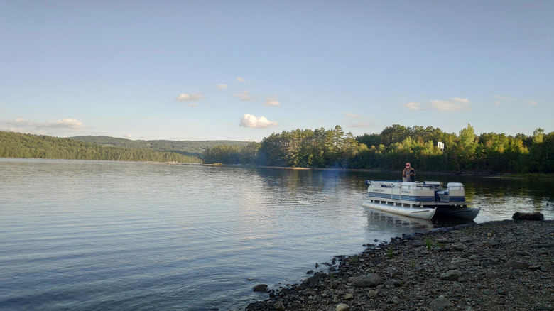 A boat entering the water at the Moore Dam Launch on Moore Reservoir, along the Connecticut River, in between New Hampshire and Vermont