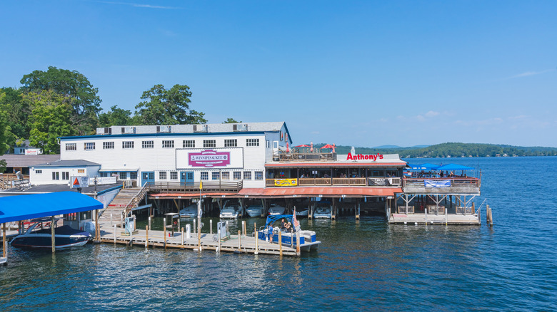 View of outdoor dining and docks along Winnipesaukee Pier