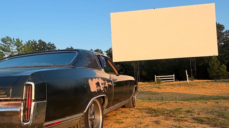 A retro car in front of a blank screen at Delsea Drive-In movie theater