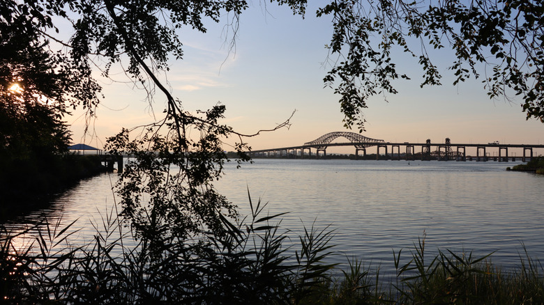 A view of the Newark Bay Bridge and Newark Bay from Stephen R. Gregg Park as the sun sets.