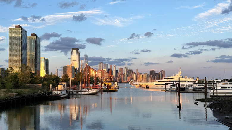 Jersey City, NJ, and Manhattan, NYC, at sunset, divided by the Hudson River