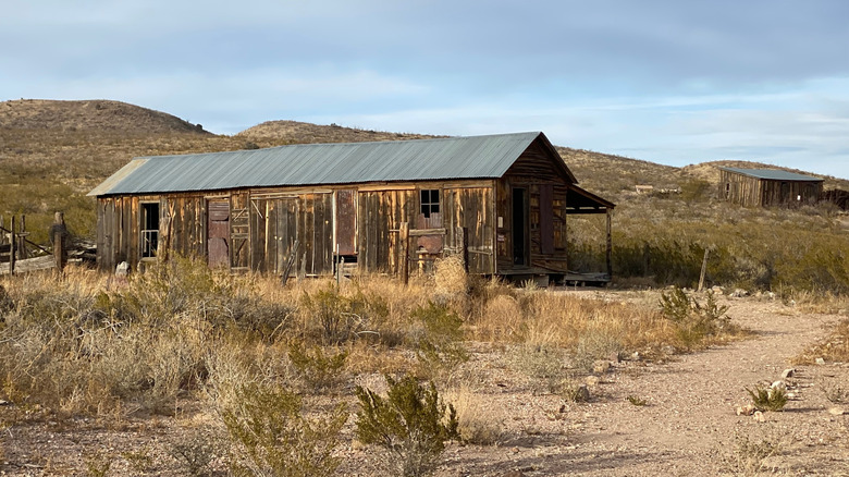 An old wood building stands in the Lake Valley Historic Townsite, New Mexico