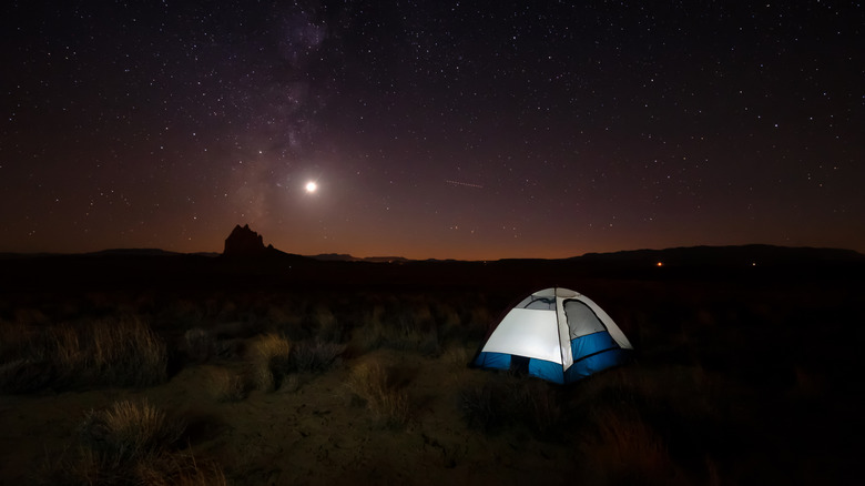 A tent under a starry sky