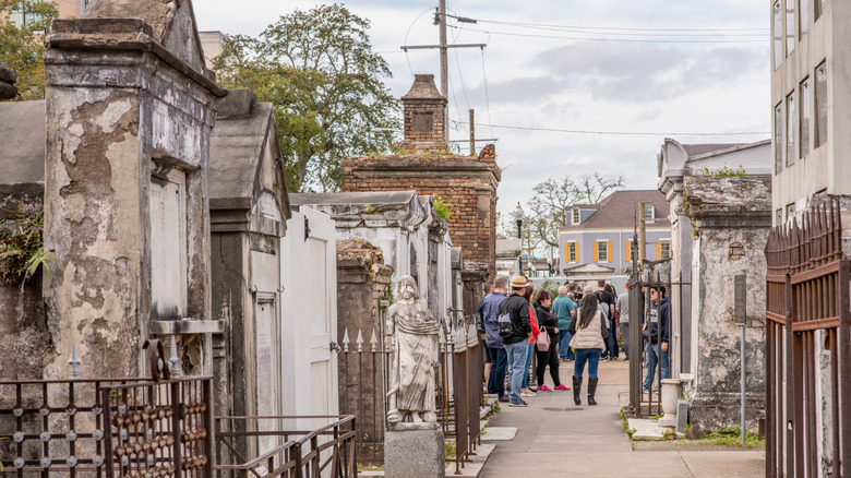People on a tour at St. Louis Cemetery No. 1