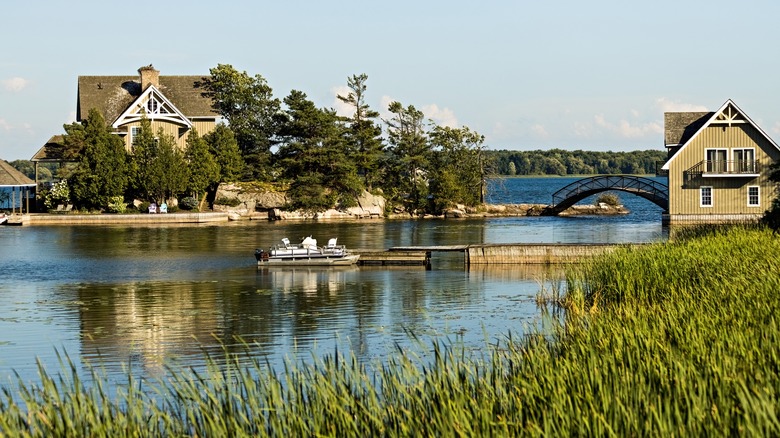 Houses at sunset on the shores of Thousand Islands, Ontario, Canada