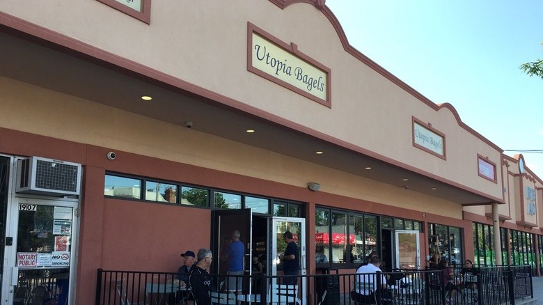 Outside the storefront of Utopia Bagels in Queens, NY