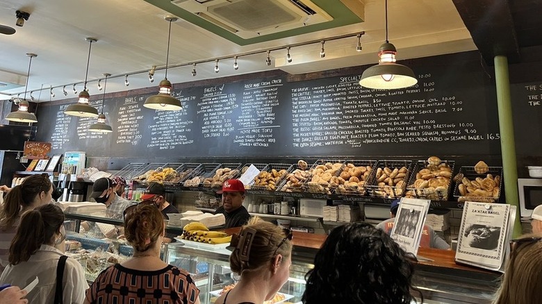 The counter and baskets of bagels at Tompkins Square Bagels, NYC