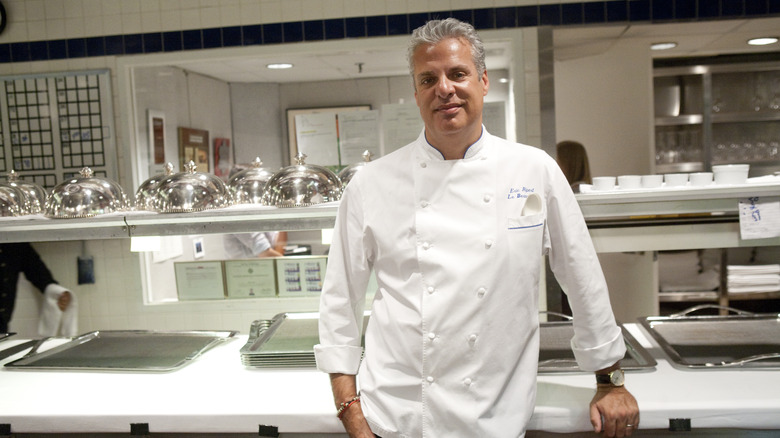 Chef Eric Ripert beside the prep area at Le Bernardin