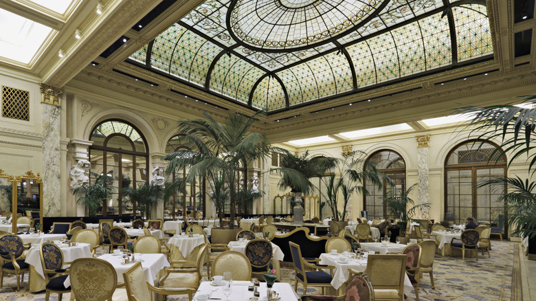 The luxurious Palm Court dining room at the Plaza