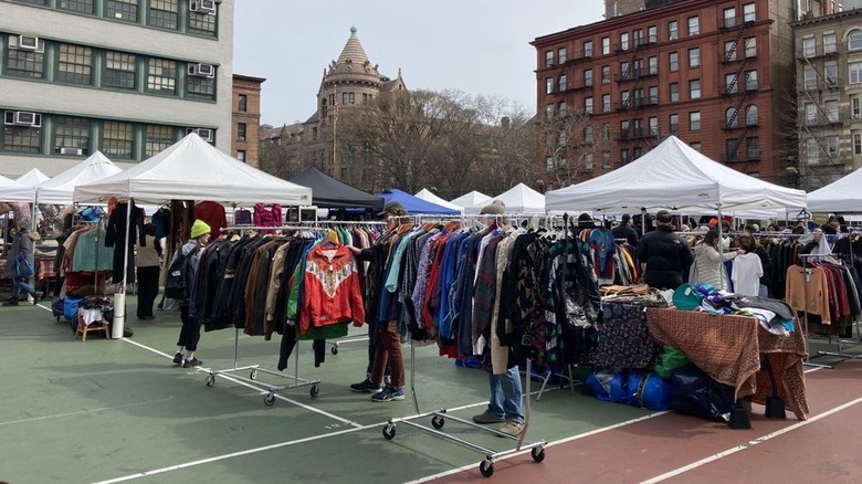 Clothing and other items are displayed in tents at the Grand Bazaar NYC